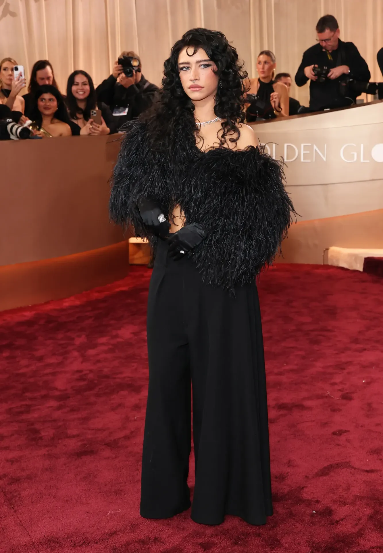 Heidi Klum wearing Vetements with metallic grillz and an edgy high-fashion look.