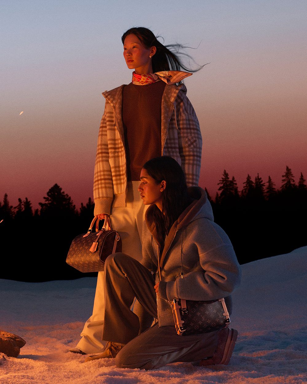 Louis Vuitton Holiday 2025 campaign Le Voyage des Lumières featuring Parisian winter scenes, luxury handbags, and soft glowing light capture